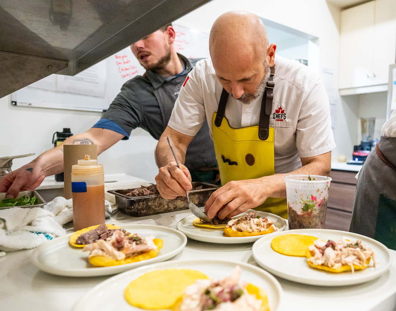 Ontario culinary entrepreneurs working in a professional kitchen